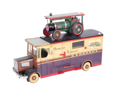 A scratch-built wooden traction engine, and a scratch-built wooden fairground removal lorry, L56cm, notes to the underside of