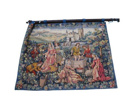 A machine-made tapestry, with Medieval grape pickers and wine making decorative picture, tapestry entitled "Le Musee Du Bin, 