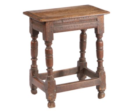 the rectangular top above a carved frieze and turned ring knopped legs united by a plain stretcher and hoof feet, 48cm wide 5