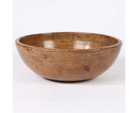 Traditional form with high sides and ring marks to the exterior, 33cm wide,12cm high.