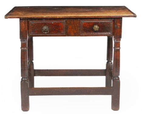 Having an end-cleated twin-boarded top, single frieze drawer with burr-yew veneer and applied twin-reserve mitre-mouldings, o
