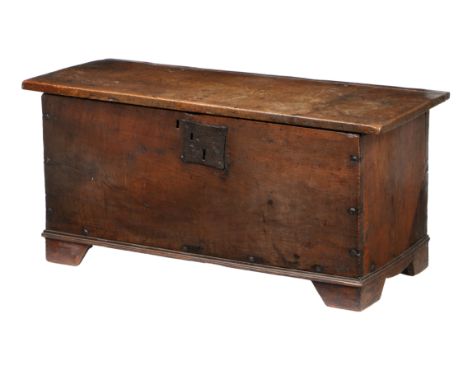 Constructed of thick boards, the interior lined with old newspapers and calligraphy practice sheets, 96cm wide 45cm high.