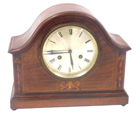 An early 20thC mahogany cased mantel clock, with walnut crossbanding and satinwood and boxwood inlay, circular silvered dial 