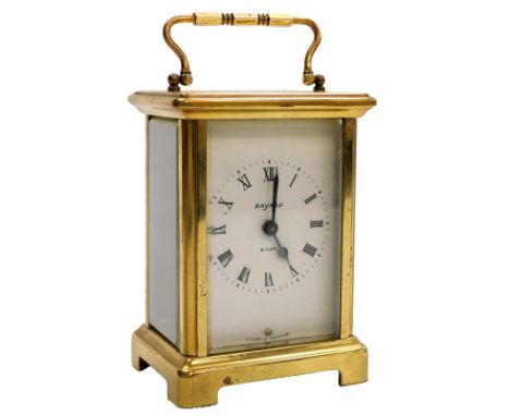 A Bayard brass cased carriage clock, rectangular white dial bearing Roman numerals, single barrel movement, the case of conve