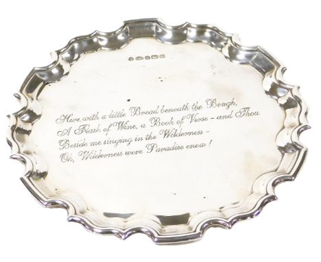 An Elizabeth II silver piecrust salver, engraved with 'Here, with a little bread... Oh, wilderness where paradise enow!', She