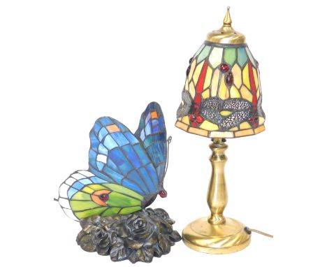 A Tiffany style table lamp, with a dragonfly stained glass shade, 40cm high, and a further table lamp, formed as a butterfly,