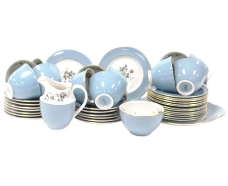 A Royal Doulton porcelain Rose Elegans pattern tea service, comprising cream jug, sugar bowl, bread plate, twelve tea cups, t