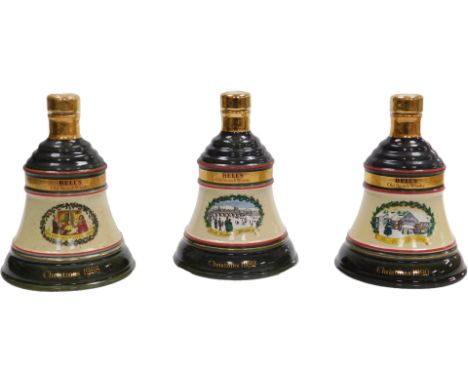 Three Bell's Old Scotch whisky 75cl commemorative decanters, cased, comprising Christmas 1988, 1989, and 1990.