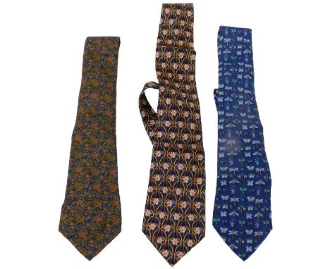 Two Nina Richi silk floral ties, together with a Salvatori Ferragamo blue tie decorated with butterflies and insects. (3)
