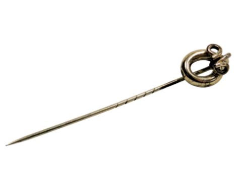 A Victorian tie pin, in an oval loop and scroll design, yellow metal, 2.2g. 