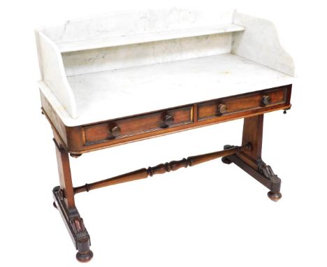 A Victorian mahogany and marble topped wash stand, the top with a three sided gallery united by a short shelf, over two friez