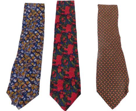 Three Givenchy silk ties, comprising a dark blue tie decorated with flowers, further blue tie with floral decoration, and a d