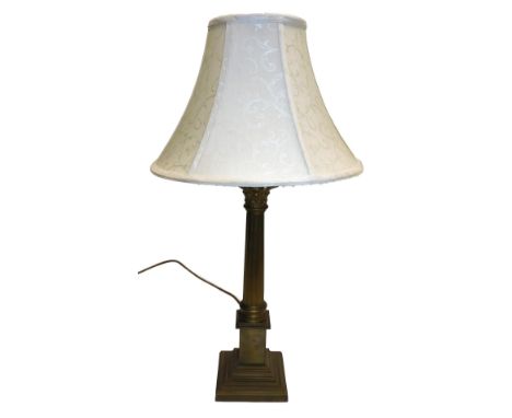 A brass Corinthian column table lamp, with shade, 65.5cm high. 