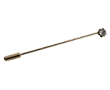 A diamond set stick pin, in yellow metal stamped 585, approx 1/8ct, 1.2g. 