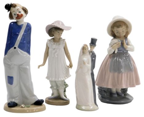 A Nadel porcelain figure of a clown, and three Nao figures, comprising a girl with a posy of flowers, bride and bridegroom, a