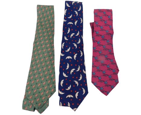 Three Hermes silk ties, comprising a green tie with frogs, a dark blue tie with half moon and stars, and a pink tie with exot