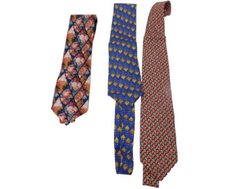 A Nazaremo Gabrielli blue tie, decorated with hot air balloons, a Jaeger tie decorated with flowers, and a Givenchy tie decor