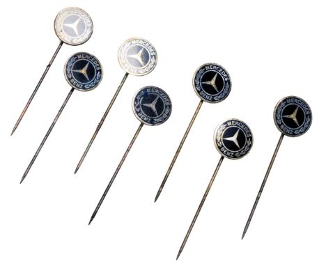 Seven Mercedes Benz tie pins.