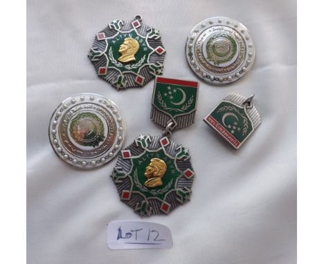 A group of 6 enamel silver and other medals and badges  
