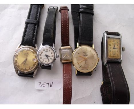 A bag of vintage watches