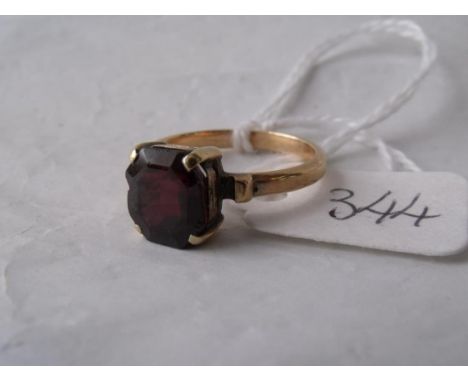 A gold mounted square cut garnet ring approx size 'K'  