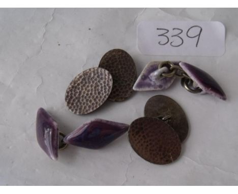 Pair of ceramic and a pair of silver cufflinks    