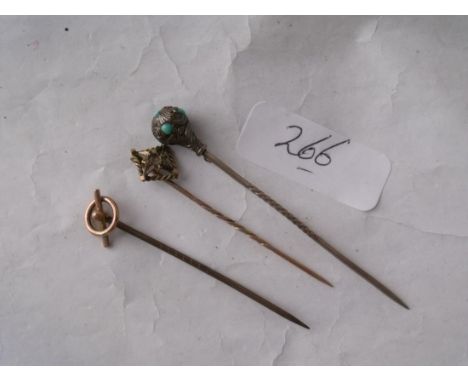 Three gold top stick pins      