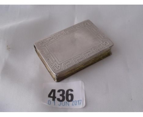 AN UNUSUAL GEORGIAN VINAIGRETTE and   snuff box in the form of a book the hinge cover revealing   a pierced grille on one sid