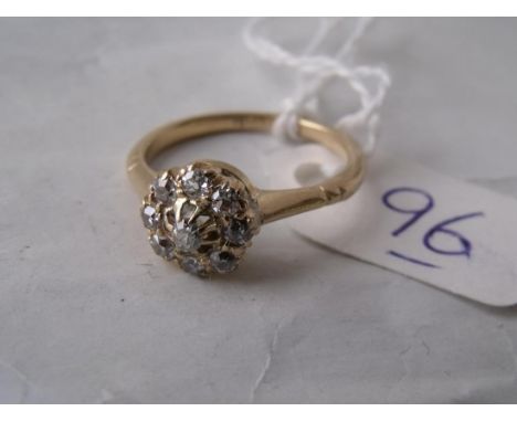 18ct gold diamond set flowerhead ring approx size 'K'  