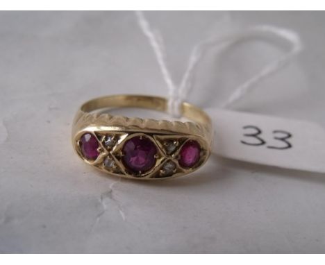 A ruby & diamond 18ct gold mounted ring approx  size 'N'         