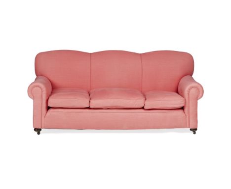 EDWARDIAN THREE SEAT SOFA  EARLY 19TH CENTURY   the triple hump back above a loose cushion seat and scroll arms, in a pale ro