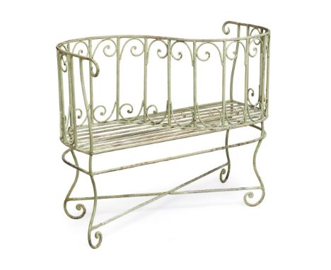 VICTORIAN 'TETE-A-TETE' WROUGHT IRON GARDEN BENCH  LATE 19TH CENTURY   the S scroll back above a slat seat, on scroll legs jo