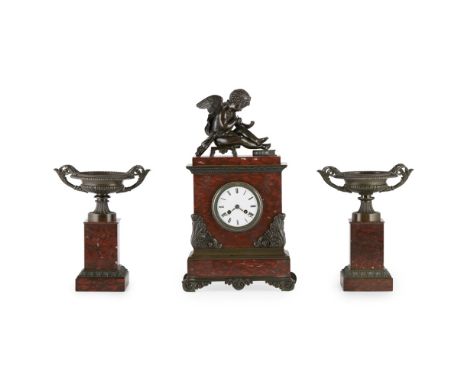 CHARLES X ROUGE MARBLE AND BRONZE CLOCK GARNITURE  EARLY 19TH CENTURY   the rectangular clock case surmounted with a bronze f