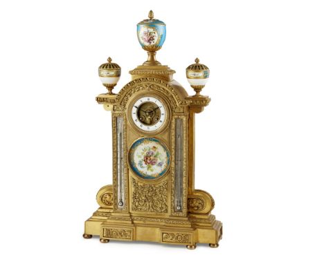 FRENCH GILT METAL AND PORCELAIN COMBINATION MANTEL CLOCK  19TH CENTURY   the open dial with a Roman numeral white enamel chap