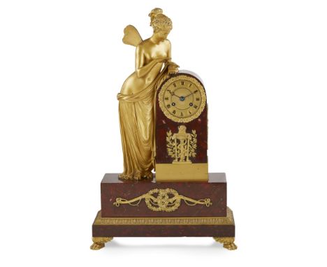 FRENCH EMPIRE GILT BRONZE AND ROUGE MARBLE MANTEL CLOCK, LAGUESS ET CIE, PARIS  EARLY 19TH CENTURY   the gilt metal Roman num