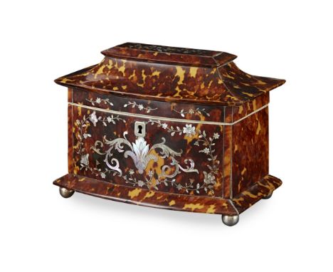 REGENCY INLAID TORTOISESHELL TEA CADDY  EARLY 19TH CENTURY   of sarcophagus form, inlaid with mother-of-pearl floral borders 