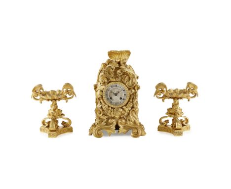 FRENCH LOUIS PHILLIPE GILT BRONZE MANTEL CLOCK  19TH CENTURY   the silvered Roman numeral dial set in a Rococo case with acan