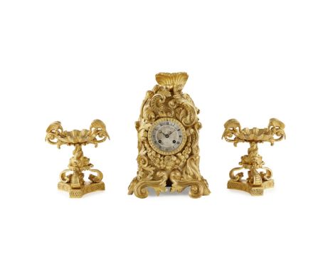 FRENCH LOUIS PHILLIPE GILT BRONZE MANTEL CLOCK  19TH CENTURY   the silvered Roman numeral dial set in a Rococo case with acan