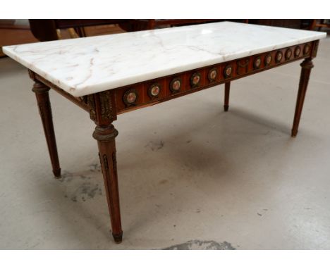 A Louis XVI style coffee table with marble top, gilt metal and ceramic mounts 