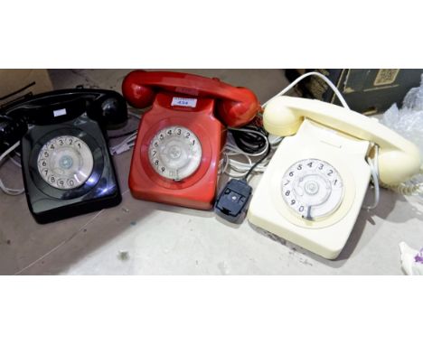 Three GPO telephones, black white and red 
