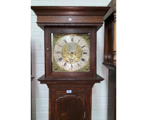 An 18th century crossbanded oak longcase clock with square top hood, full length door, square brass dial with silvered chapte