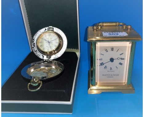 A modern Mappin &amp; Webb brass carriage clock; a "Dalvey Voyager" period style pocket watch in terrestrial map outer case 