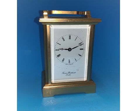 A modern brass carriage clock by Thomas Braithwaite, London, a modern pocket watch/wall clock 