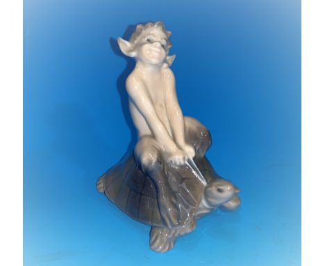 A Royal Copenhagen porcelain figure of a faun riding a turtle, 3.75" 