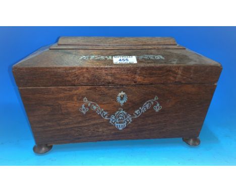 An early 19th century sarcophagus shaped tea caddy in rosewood with mother of pearl inlay and fitted interior {1 ring handle 