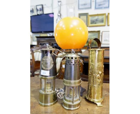 Two miners lamps "The Protector, Eccles" and another (electrified) a Victorian oil lamp, a companion stand 