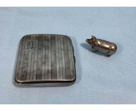 A hallmarked silver engine turned vesta case; a novelty silver plate pig vesta case 