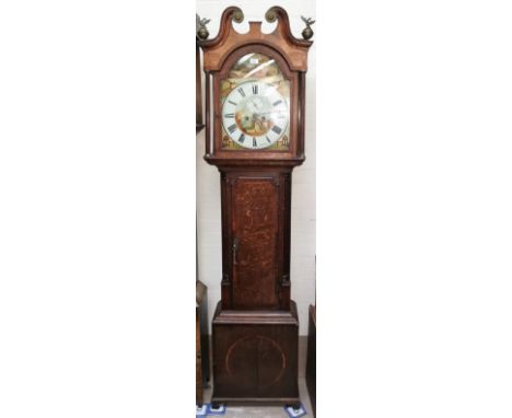 A late 18th century oak longcase clock with mahogany crossbanding, swan neck pediment and turned columns, and full length doo