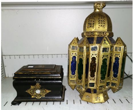 A 19th century inlaid papier mache 2 division tea caddy with gilt decoration, a Middle Eastern style brass and coloured glass
