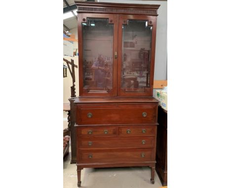 An Edwardian mahogany secretaire bookcase with 2 glazed doors over fitted fall front drawer, 2 long and 2 short drawers bello